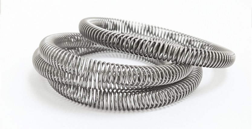 斜圈觸指彈簧，